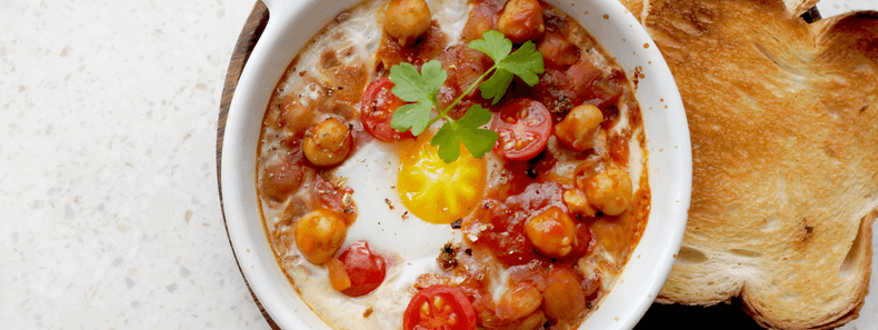 Lightly Spiced Baked Eggs with Spinach and Mixed Herbs